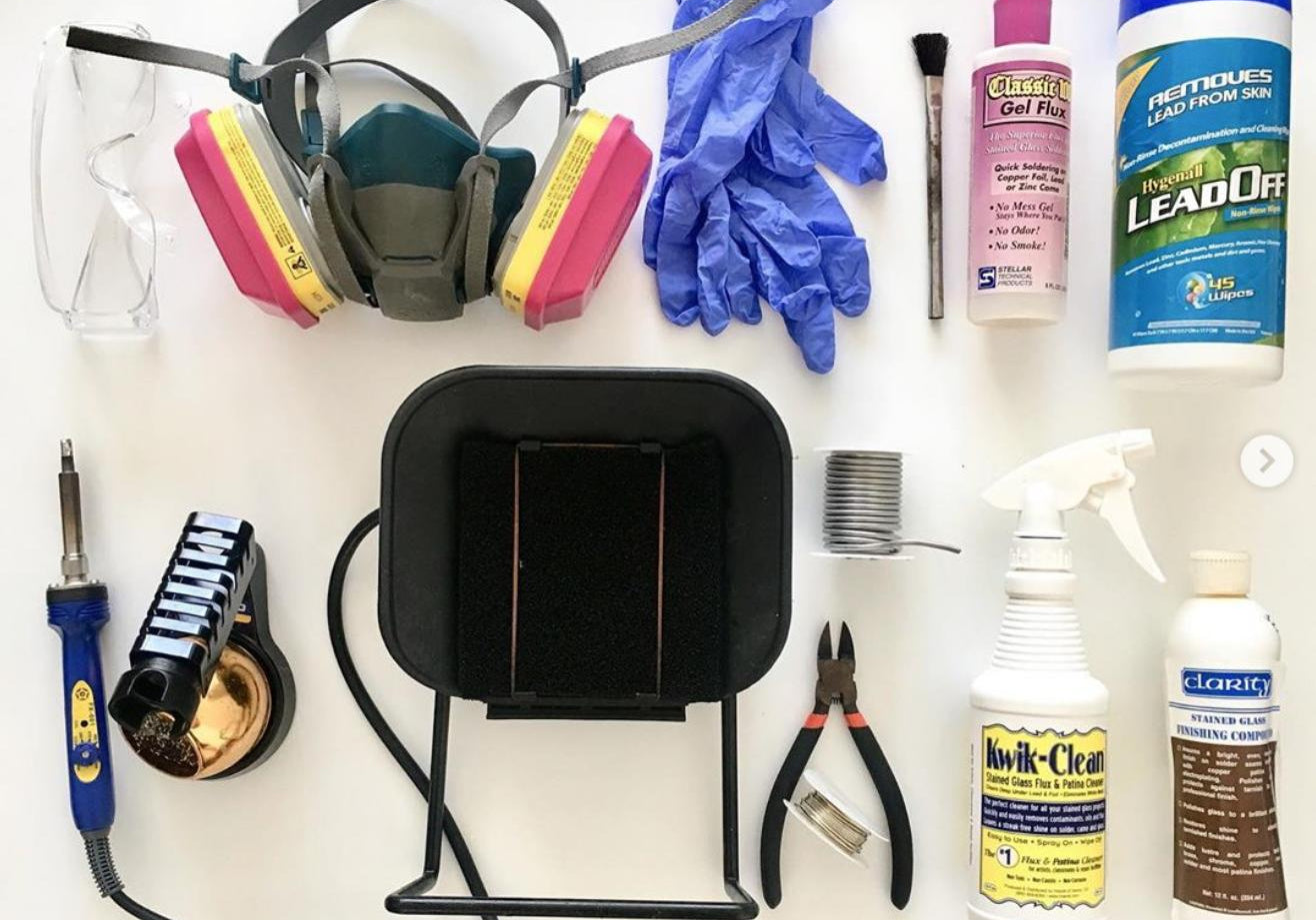 Flat lay of tools needed for stained glass