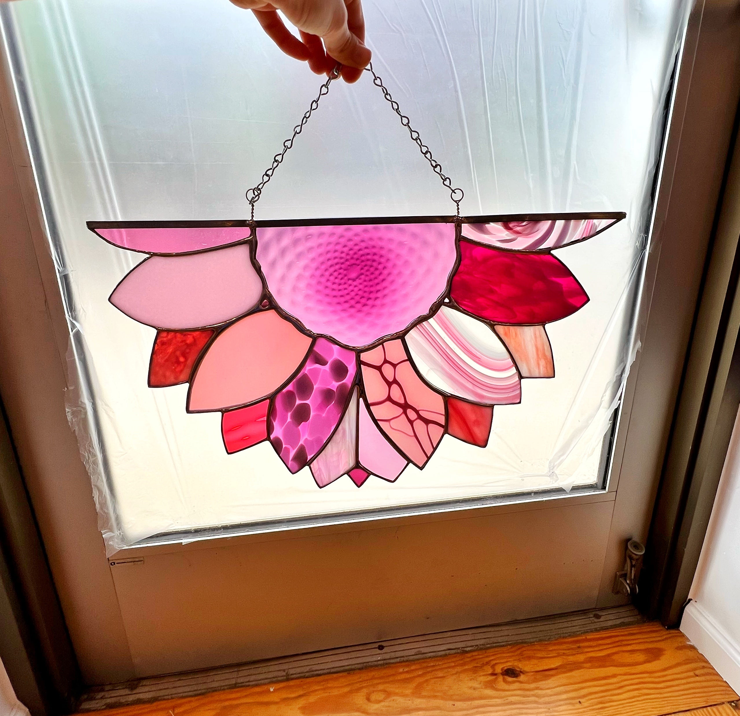 Pink Stained glass flower cut in half