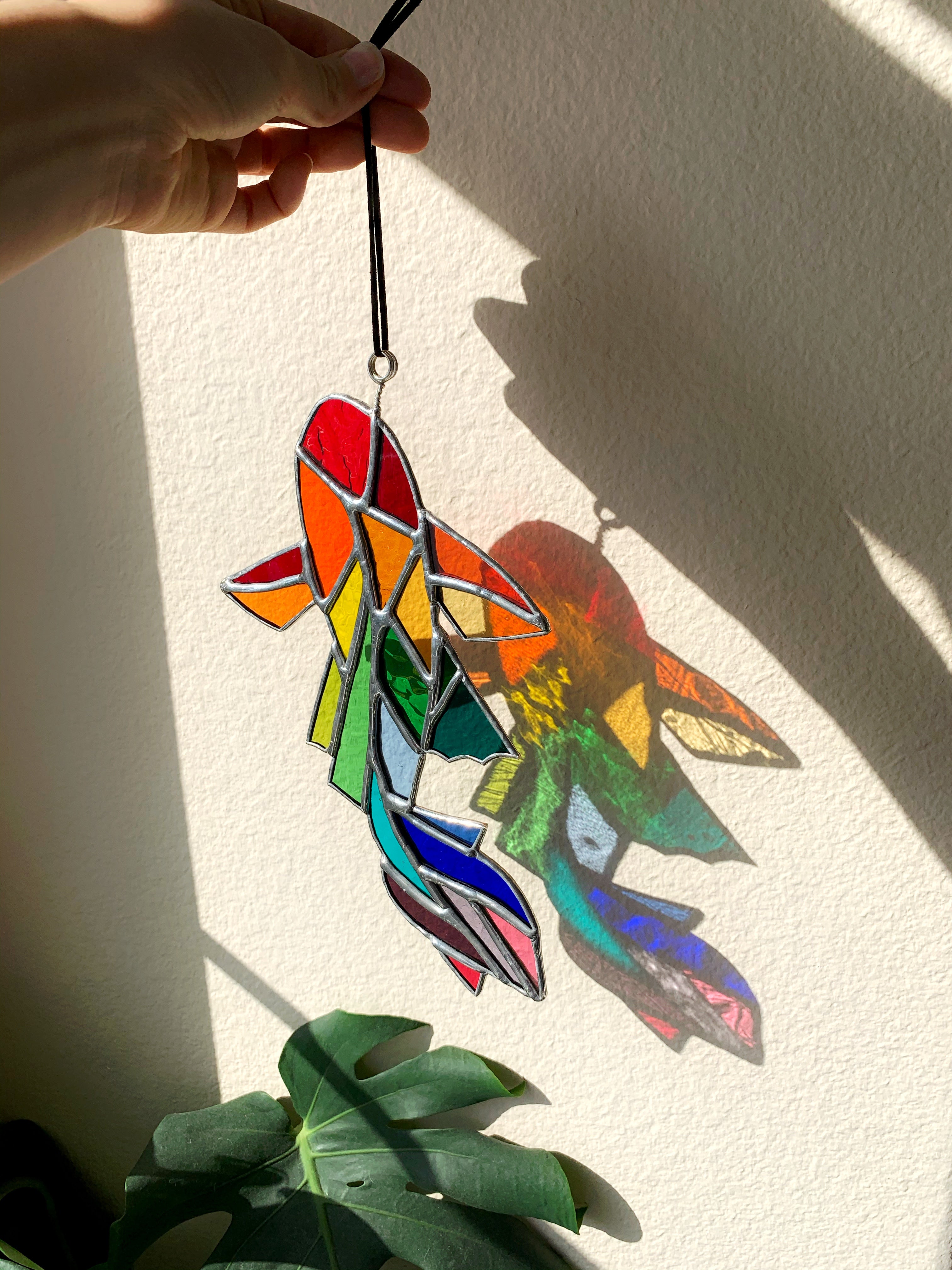 Stained glass rainbow fish