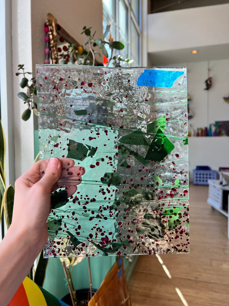 Clear With Green Confetti And Red Blobs Uroboros Colorado Glass Works