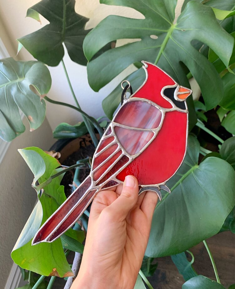 Stained glass cardinal