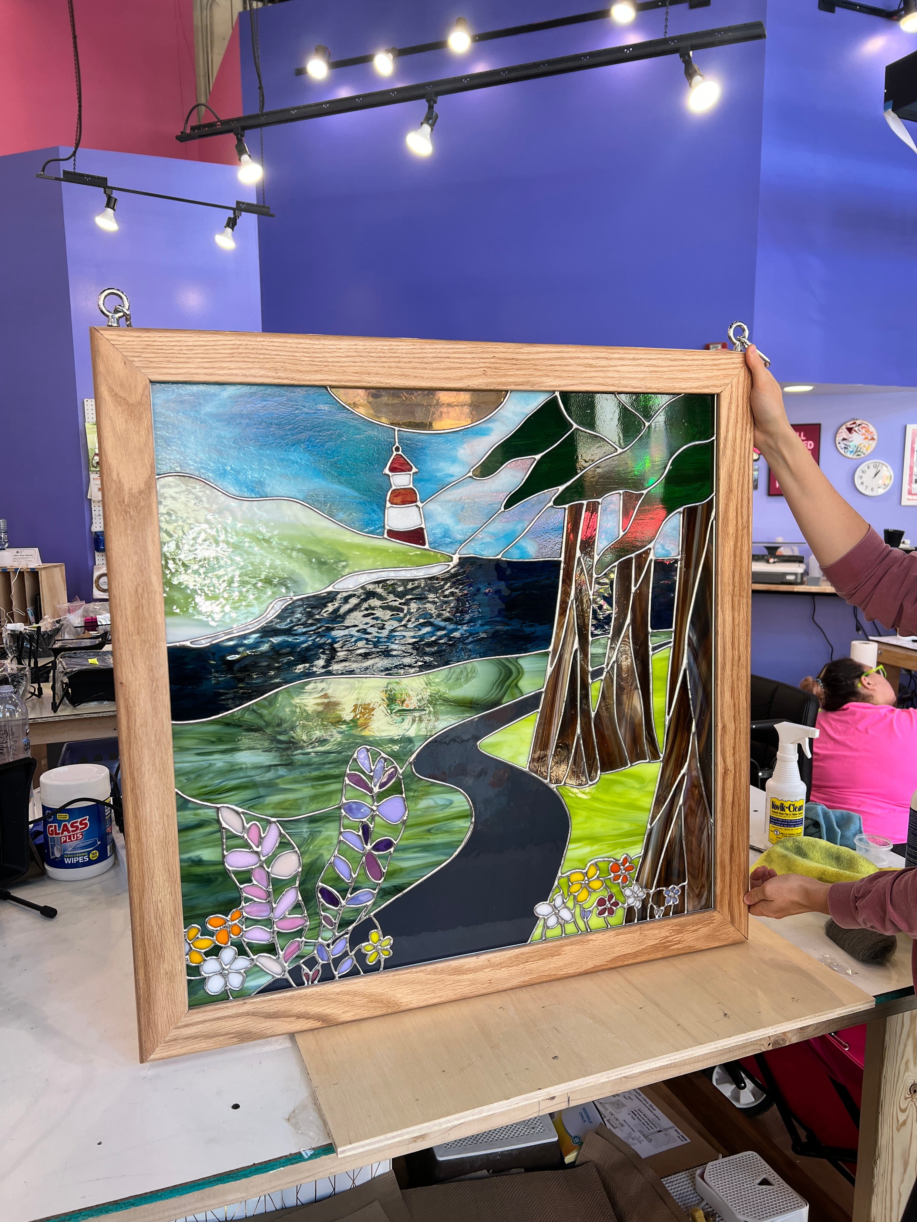 A Stained glass mountain scene paired with the oregon coast in glass - LARGE WINDOW