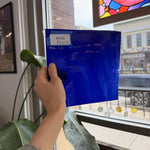 Blue on White on Clear Lamberts Flash Glass