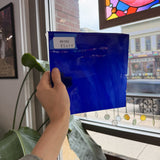 Blue on White on Clear Lamberts Flash Glass