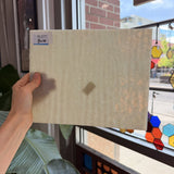 Cream Vanilla Mottled Single Roll Bullseye Sheet Glass